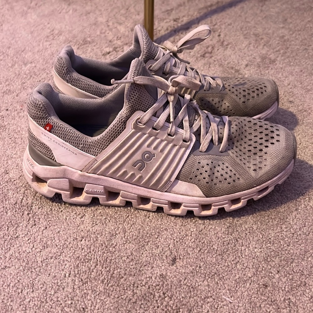 Grey women's on cloud running shoes.  These are used but in good condition.
